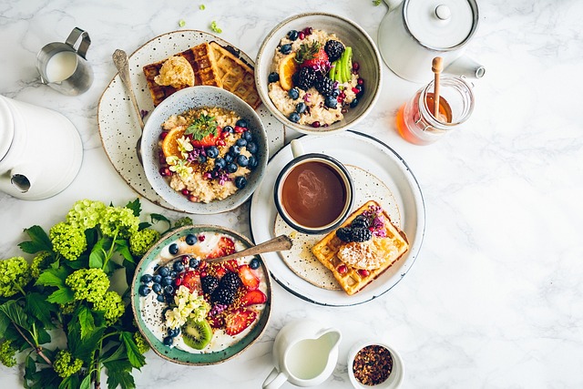 A typical breakfast meal with eggs, toast, and fruits